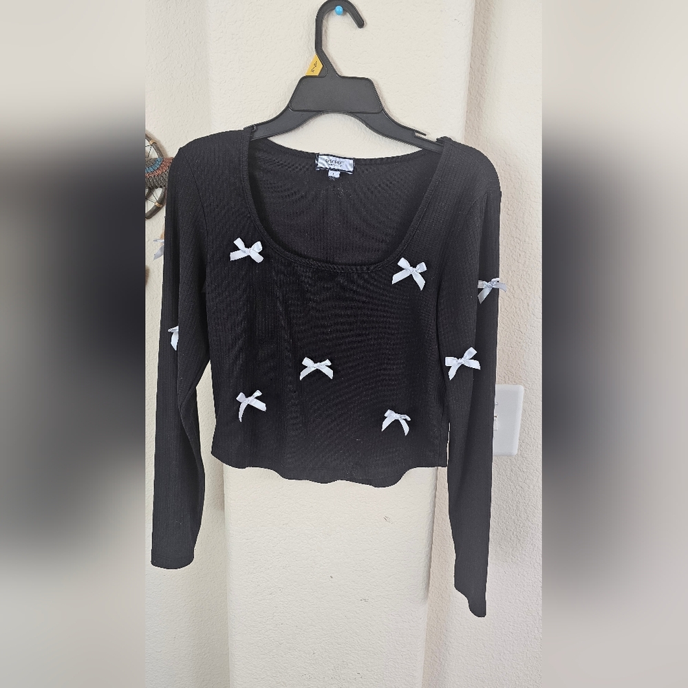 Elegant Black Top with White Accents